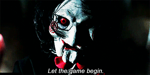 Jigsaw puppet saying let the game begin